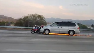 Motorcycle stuck to front of minivan, throws sparks on 91 Freeway in Corona I ABC7