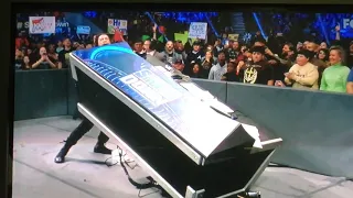 Roman Reigns picks up announce table and throws it on Robert Roode Smackdown November 29th 2019