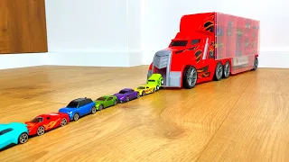 Lot of Tomica Cars sliding down from big red truck Transporter #2