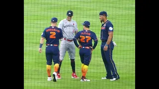 Carlos Correa greets Jose Altuve and Astros players in pre-game warm-up...Astros vs Twins...5/29/23