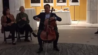 Yo Yo Ma performing Bach at reception for screening of the Music of Strangers