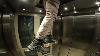 Elevator Surfing Down Town
