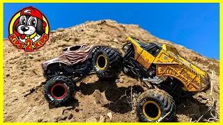 Monster Jam Truck TOYS - Wolf's Head & Earth Shaker PLAY at the PARK & HUGE Mud Mountain WATER ARENA