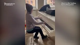 Ukrainian pianist Iryna Manyukina plays Chopin in the ruins of her home, which was damaged when a Ru