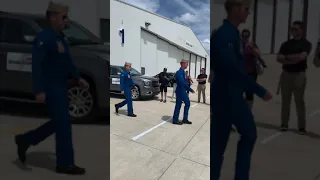 Up-close view of Blue Angels walking to van
