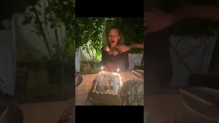 Birthday candles lit her hair!