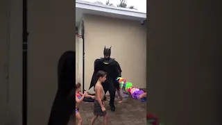 Batman dancing with Kids at birthday