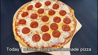 Simple homemade pepperoni pizza made with easy store-bought ingredients #pizza #homemade #baking