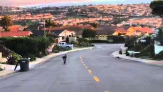 Kid skateboarding downhill wipe out and road rash . Dana point, California