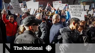 Thousands protest in Calgary as Trudeau meets with oil industry leaders