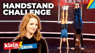 Karoline Herfurth vs. Mila (12): Wer schafft mehr Schritte im Handstand? | Klein gegen Groß