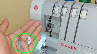 como cambiar y ajustar las cuchillas en la maquina de coser overlock familiar.