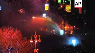 Ukrainian police are moving in on a large protest camp in the center of Kiev after nine people were