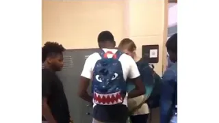 Giving cloths to the bullied  classmate