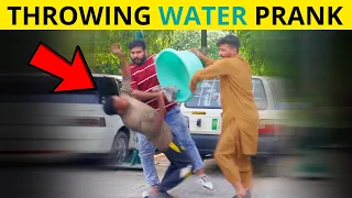 Throwing water on people prank | Israr World