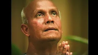 Sri Chinmoy plays on the Cembalo