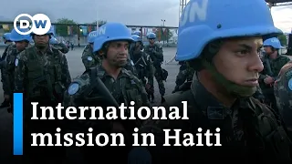 UN votes to deploy armed force to combat gang violence in Haiti | DW News