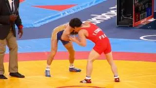 Dzhamal Otarsultanov (Russia) - Yang Kyong Il (North Korea) . Men's 55kg Freestyle Wrestling