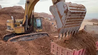 Caterpillar 365C Excavator Loading Mercedes & MAN Trucks