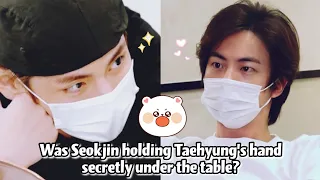 Taejin/JinV: Was Seokjin holding Taehyung’s hand secretly under the table? 🤔🤔