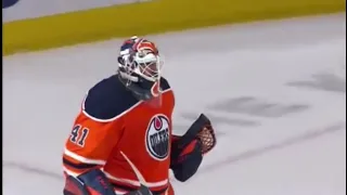 Edmonton Oilers fans cheer after clinching their playoff spot