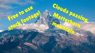 Free Nature Stock Footage: Clouds Touching The Tip of Matterhorn Mountain