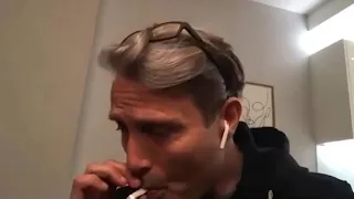 stan twitter mads mikkelsen smoking while wearing airpods meme