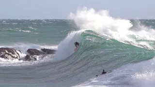 Pro Surfers charge GNARLY storm surf wave !!!