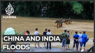 Floods wreak havoc in parts of China, India