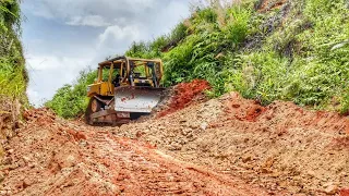 Caterpillar D6R XL Highly Powerful Bulldozer In Cutting Cliffs For Widening Mountain Roads