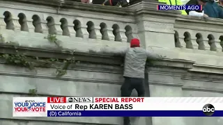 Video shows pro-Trump protesters scaling US Capitol Building