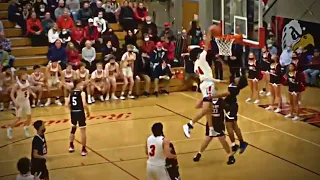 Benet Academy's Kyle Thomas with a dunk