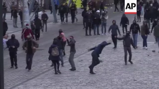 Clashes erupt outside Marine Le Pen's rally