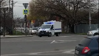 Police prison truck responding with siren yelp