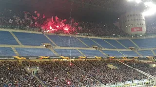 Eintracht Frankfurt fans throw pyro on the roof of San Siro