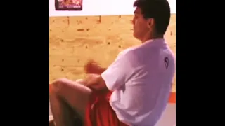 Frank Shamrock coaching the knee bar from guard and Ken Shamrock doing it live against Bas Rutten.