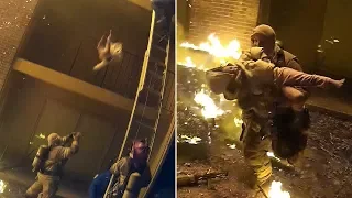 Firefighter Catches Child Dropped from Burning Building