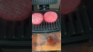 COOKING HAMBURGERS ON THE GEORGE FOREMAN SUBMERSIBLE GRILL.