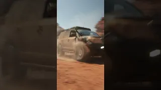 200 Series Land Cruiser crosses a river on Onion Creek in Moab