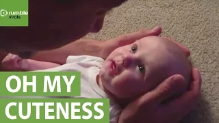 Baby girl has emotional reaction to daddy's singing