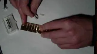 waxing the rivet end - harmonica customization - overblow.com