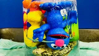Toys FROZEN IN SOLID ICE Sesame Street Figures Video!