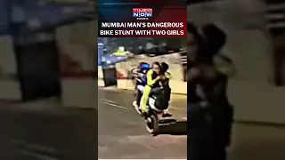 Watch! Man Performs Dangerous Bike Stunt With Two Girls In Mumbai