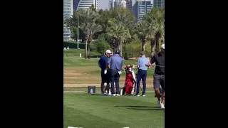 Watch Rory McIlroy ignore Patrick Reed when he tries to say hi and after he throws a tee in Dubai