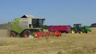 Combining Barley with Claas Tucano 420 & John Deere in support - Harvest 2019