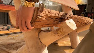 Sophisticated Techniques In Woodworking/A Sturdy Chair From A Tree Trunk Made By A Skilled Carpenter