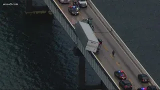 Semi truck dangles over edge of Bay Bridge