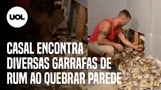 Casal acha estoque gigantesco de garrafas ao quebrar parede da casa