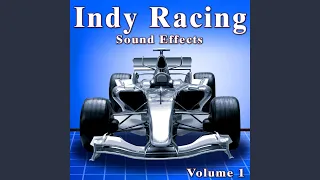 Three Cart Indy Cars Pass by Fast and Downshift on Turn from Right to Left and Accelerate out...