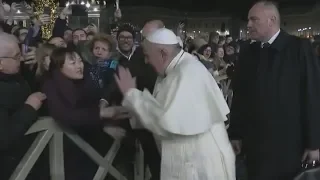 Pope Francis slaps woman's hand who grabbed him: raw video